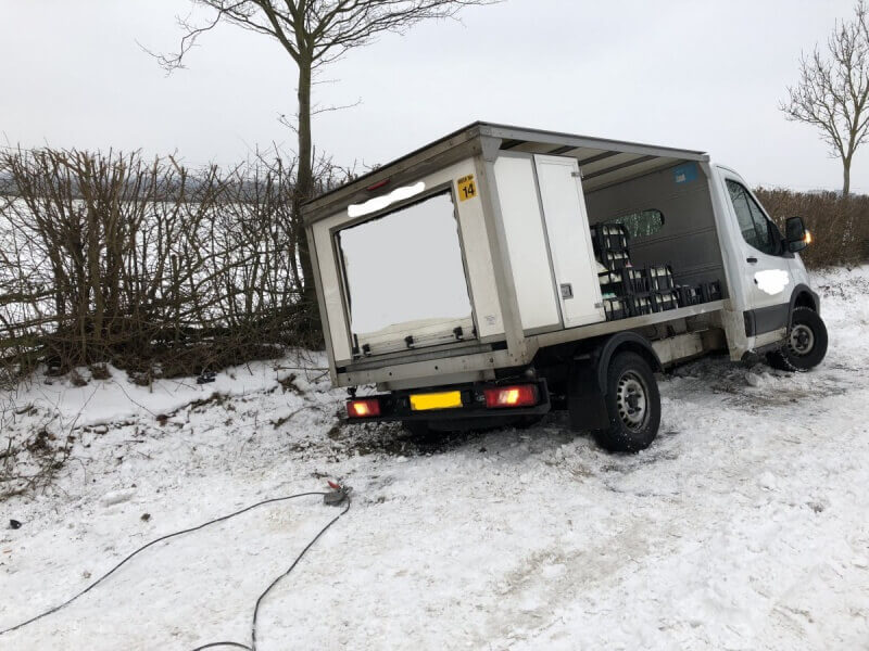 Recovering a vehicle from icy conditions